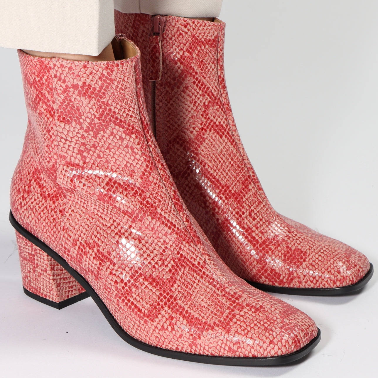 Pink snake print outlet boots